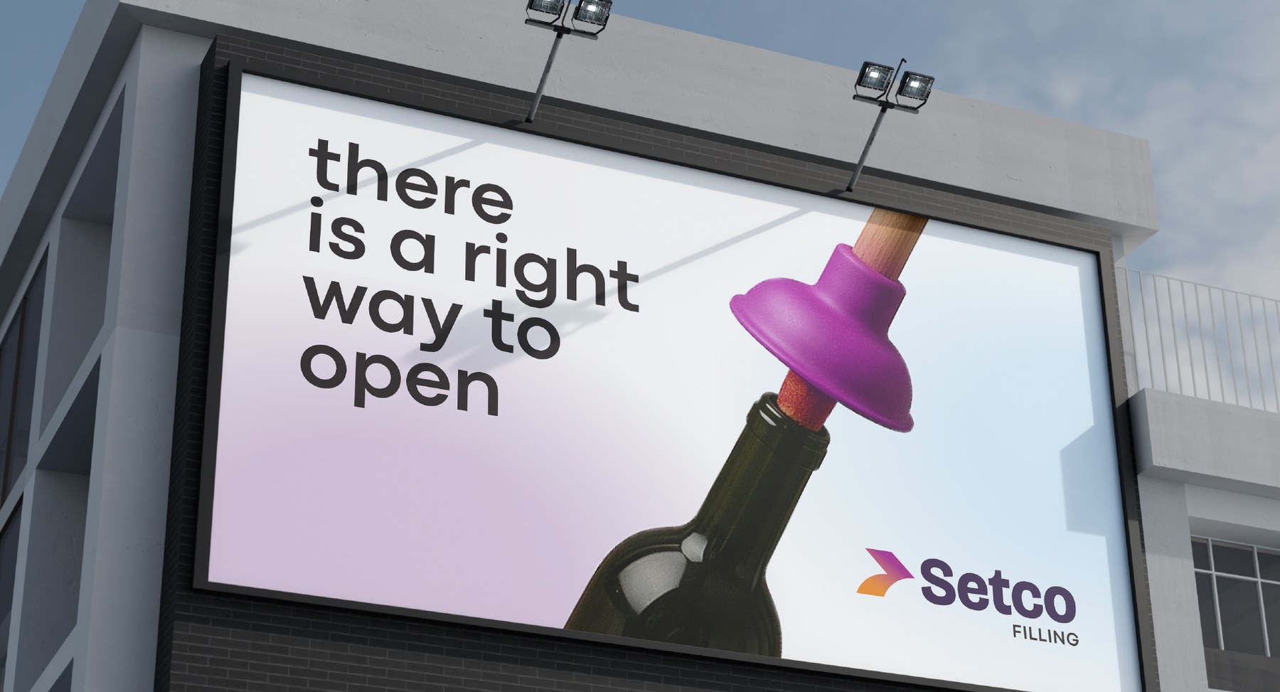Billboard reading there is a right way to open, with a plunger opening a wine bottle